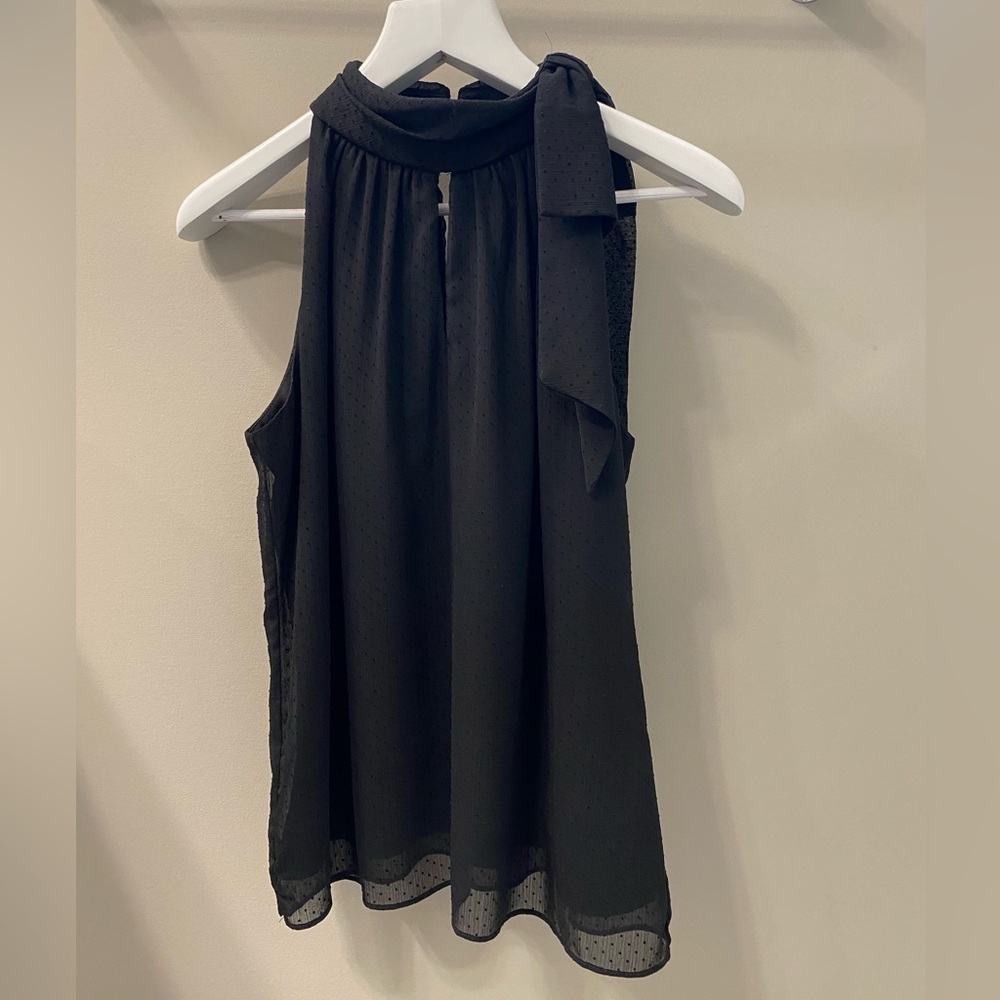 NWOT White House, Black market polkadot keyhole top with shoulder bow. Size M